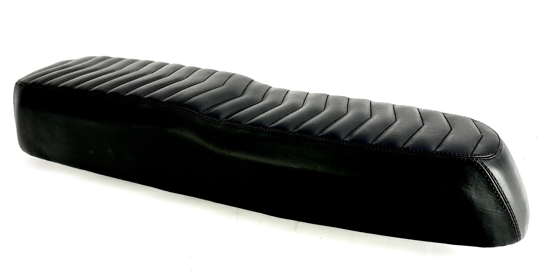 Black bench seat with quilted seams