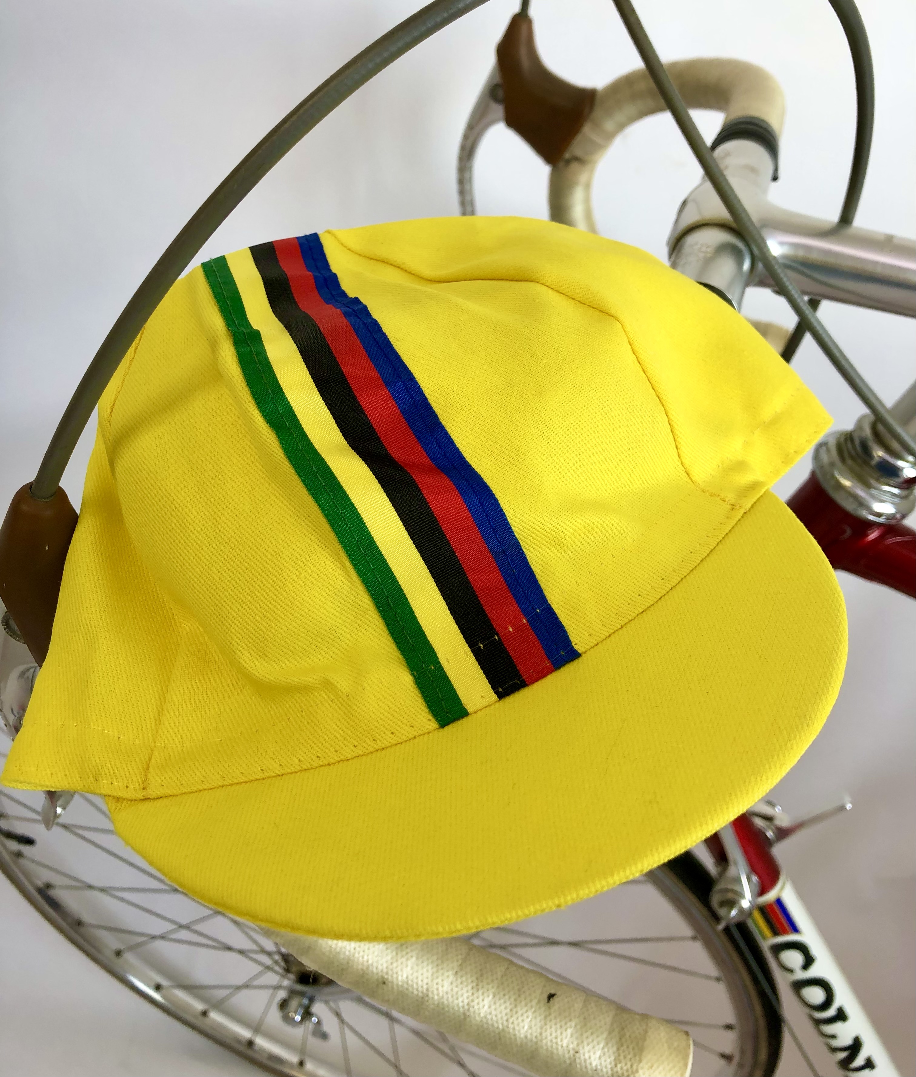 Cycling Cap yellow with colored stripes